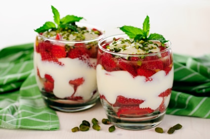 Greek yogurt with strawberries, honey and pistachios