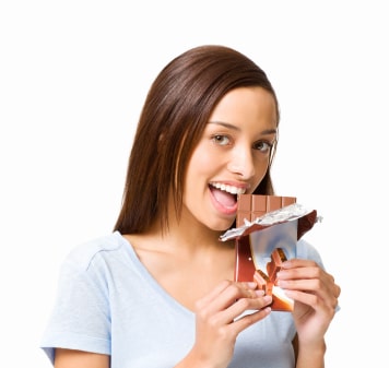 Girl Eating a Chocolate Bar