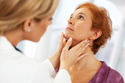 Female doctor examining her patient.