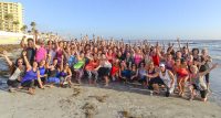image of the Cathletes on the beach in Daytona for the official group photo for the Daytona Road Trip