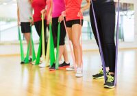 image of exercisers using resistance bands