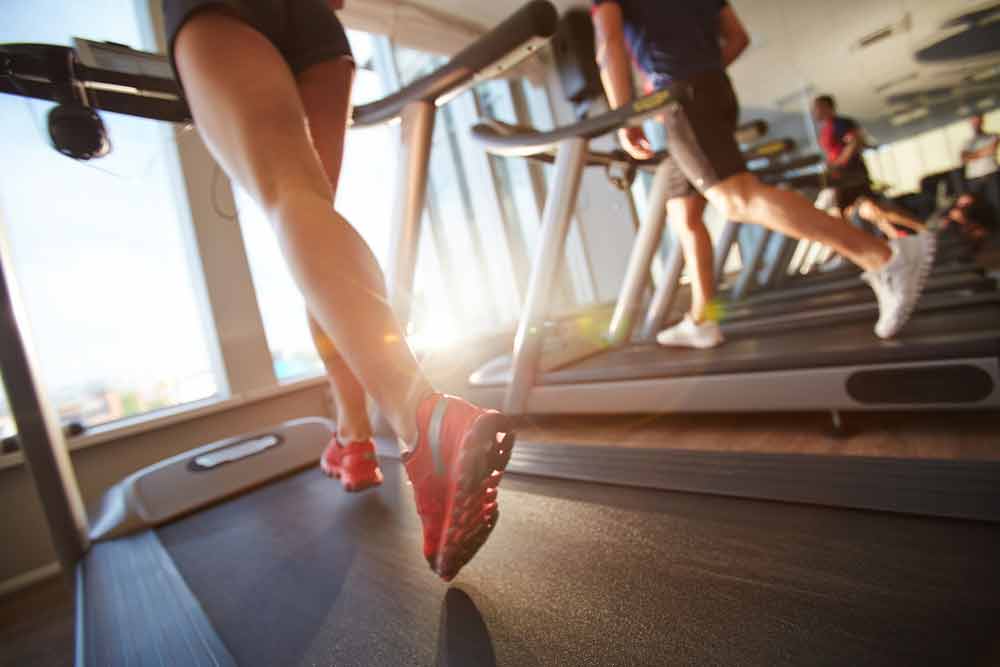 image of female running on treadmill. Are you making these cardio mistakes?