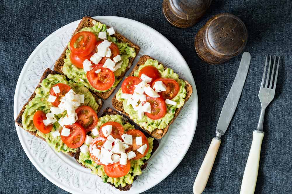 image of four avacado toast sandwiches as another way to enjoy breakfast vegetables in the morning