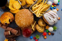 image of unhealthy fast food, sweets and salty snacks