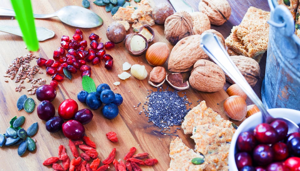 image of variation of superfoods breakfast on wooden table background