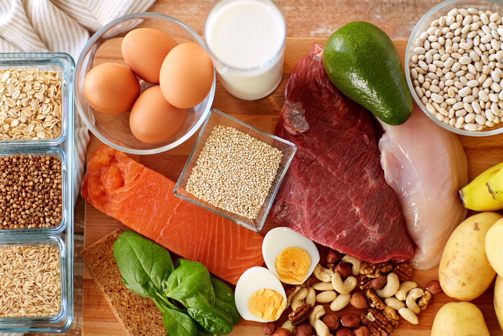 image of healthy eating and diet concept - natural rich in protein food on table