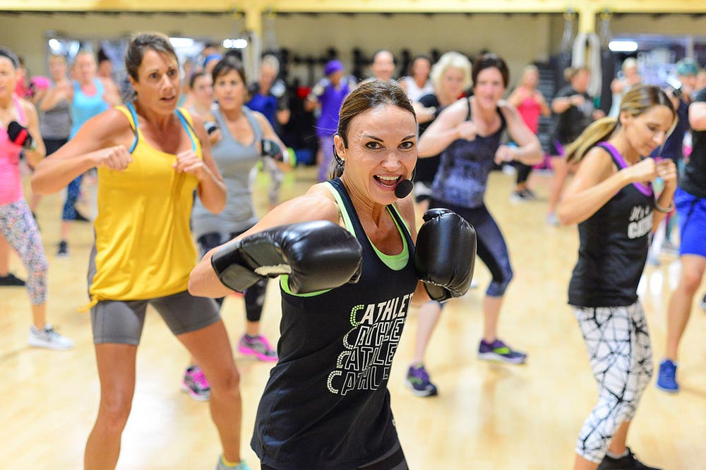 image of Cathe Friedrich during the Glassboro Road Trip doing an aerobic exercise kickboxing aerobics class