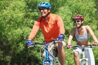 image of a man and a woman riding bicycles