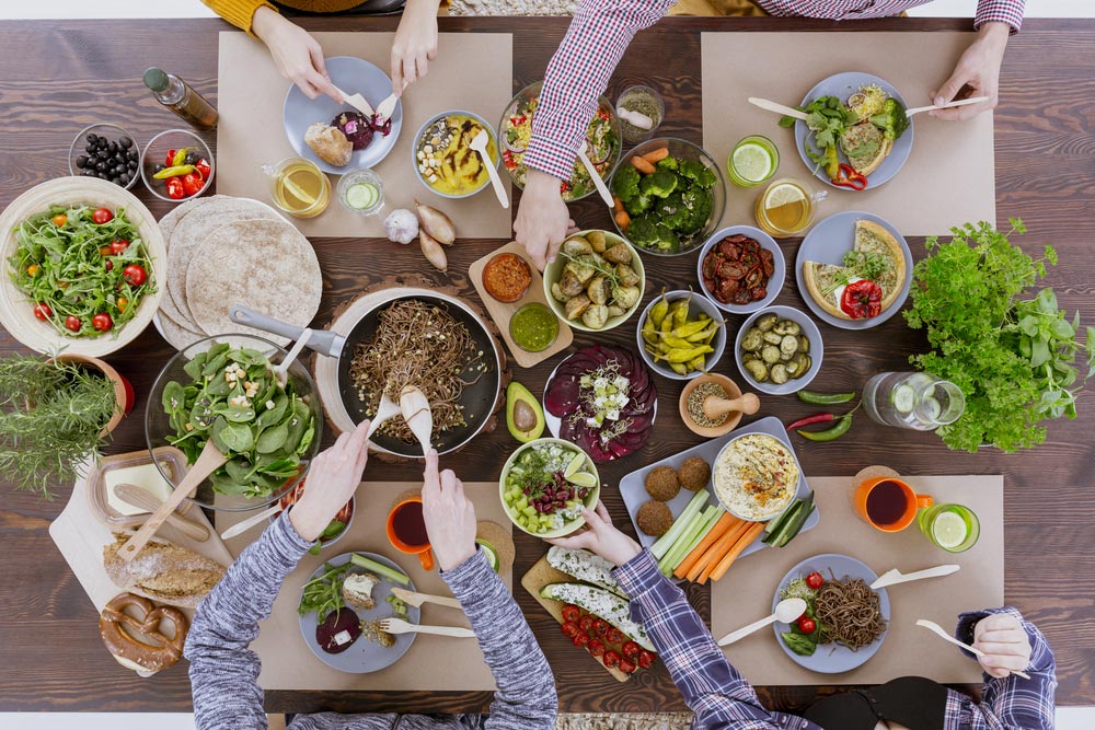 image of green healthy vegetarian food for lunch with friends