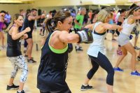 image of Cathe Friedrich leading a kickboxing class during the Glassboro road trip
