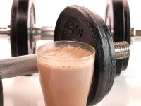 Fitness drink with heavy weights. Are you getting enough daily total protein