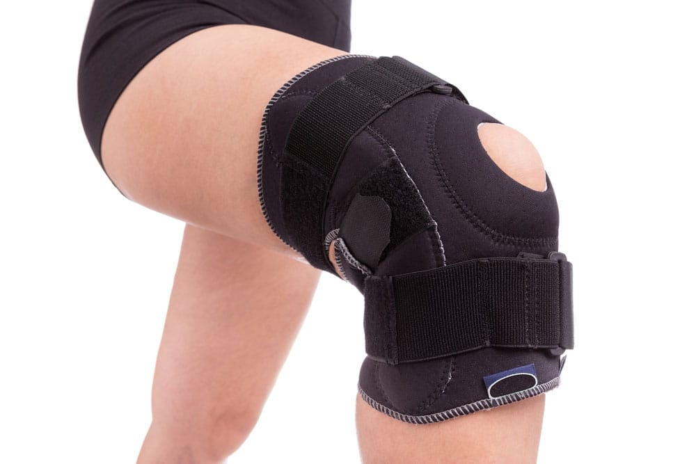 Knee Braces: What They Do & How To Wear One