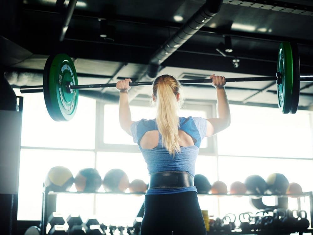 Women Who Wear a Weightlifting Belt May Be at Risk of This Problem